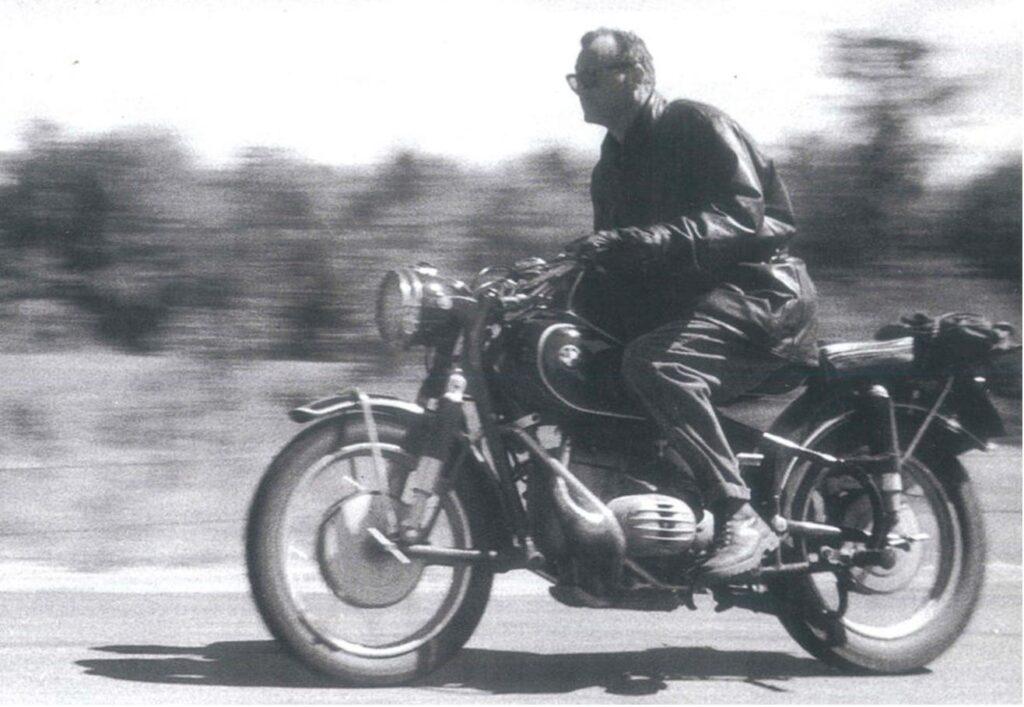 C. Wright Mills on BMW Motorcycle